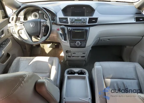 2014 Honda Odyssey Touring z USA, uszkodzony, nr VIN 5FNRL5H94EB094357